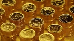 Падение доллара в связи с сохранением QE обусловило рост золота